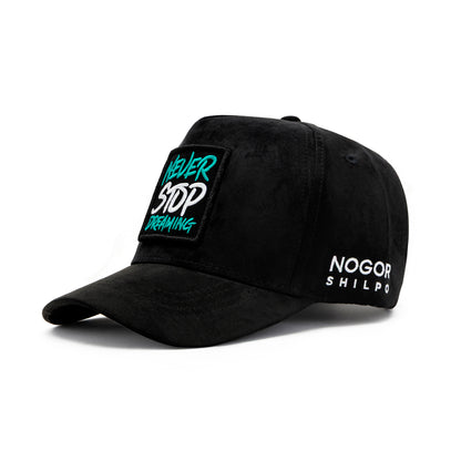 Inside view of Nogor Shilpo black suede cap with branded lion seam tape and crown lining