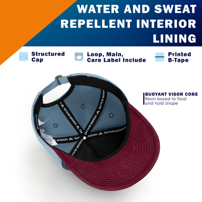 Maroon and blue cap with text about water and sweat repellent interior lining on a white background