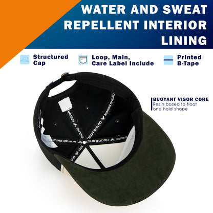 Black cap with white geometric pattern on a white background, featuring text about water and sweat repellent interior lining.